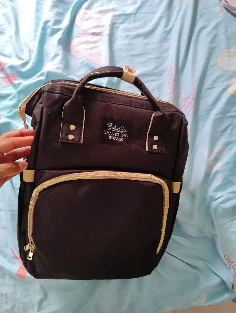 Foto de reseña de Cliente Baby On sobre Morral Pañalera Tipo Cuna 3 en 1 con Cambiador Baby On USB y 3 Bolsillos Térmicos
