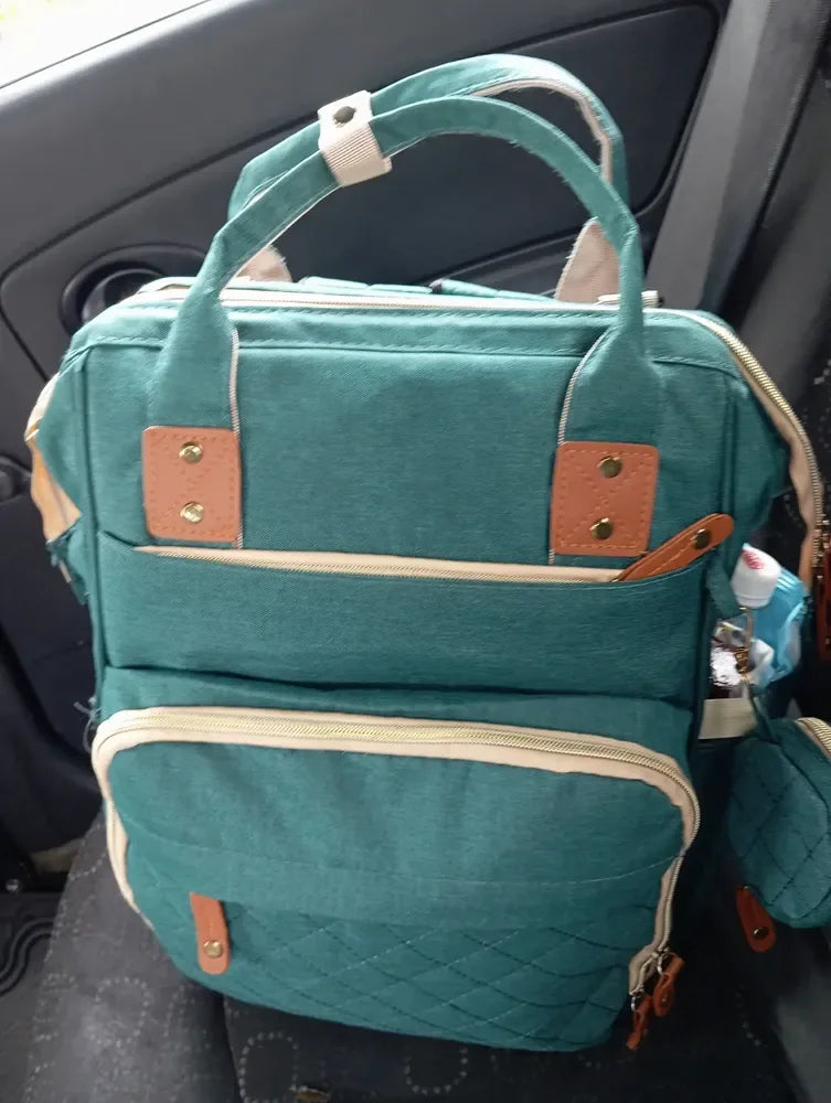 Foto de reseña de Cliente Baby On sobre Morral Pañalera Tipo Cuna 3 en 1 con Cambiador Baby On USB y 3 Bolsillos Térmicos