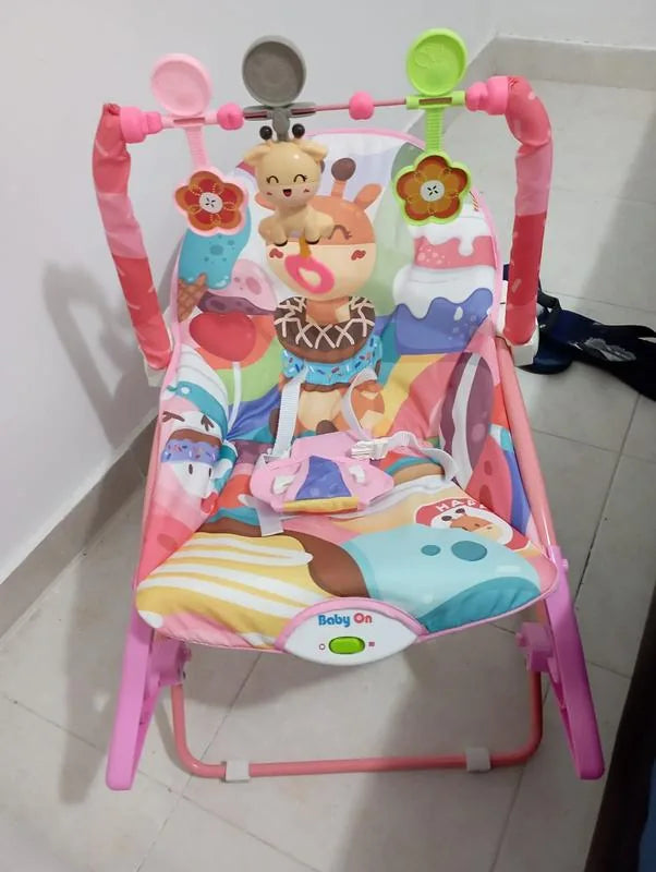 Opinión de Scharit sobre Silla mecedora vibradora y musical para bebé 3 en 1 Baby On