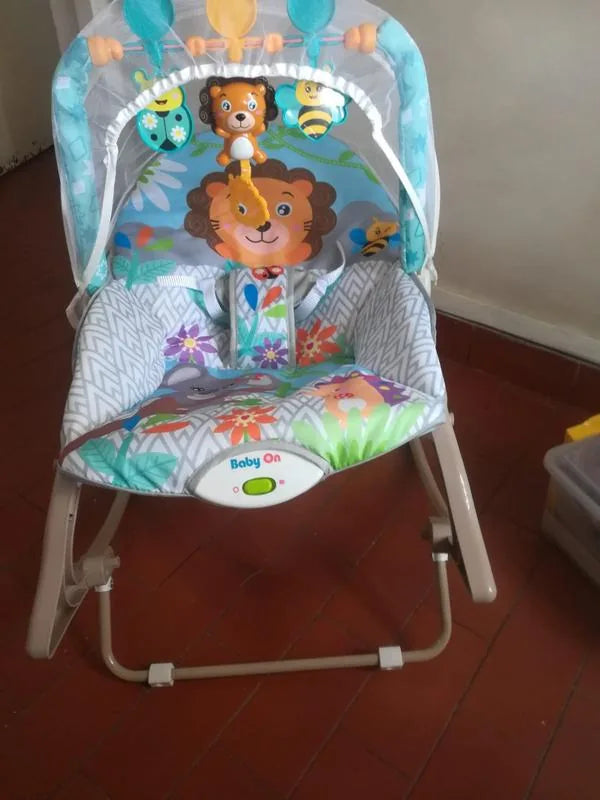 Opinión de Vernica sobre Silla mecedora vibradora y musical para bebé 3 en 1 Baby On