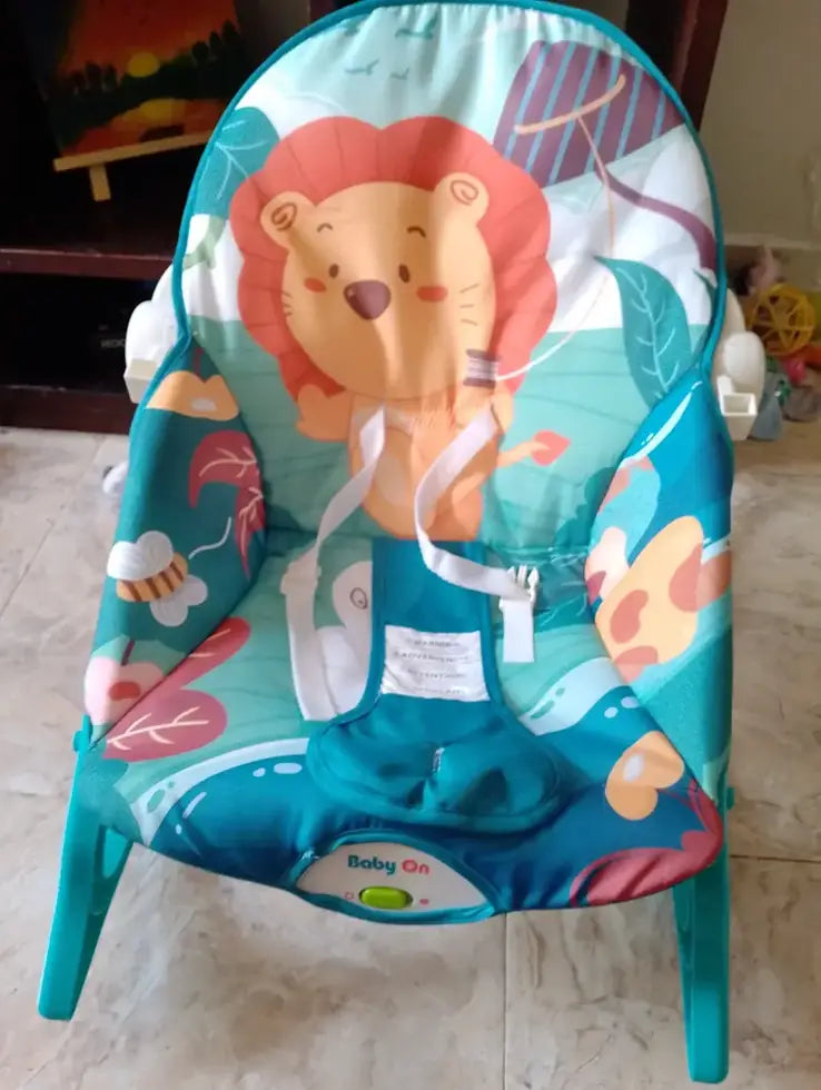 Foto de reseña de Cliente Baby On sobre Silla mecedora eléctrica para bebé Baby On NS4-1 Rey de la Selva