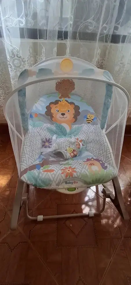Foto de reseña de Cliente Baby On sobre Silla mecedora eléctrica para bebé Baby On NS4-1 Rey de la Selva