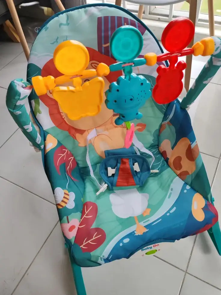Foto de reseña de Cliente Baby On sobre Silla mecedora eléctrica para bebé Baby On NS4-1 Rey de la Selva